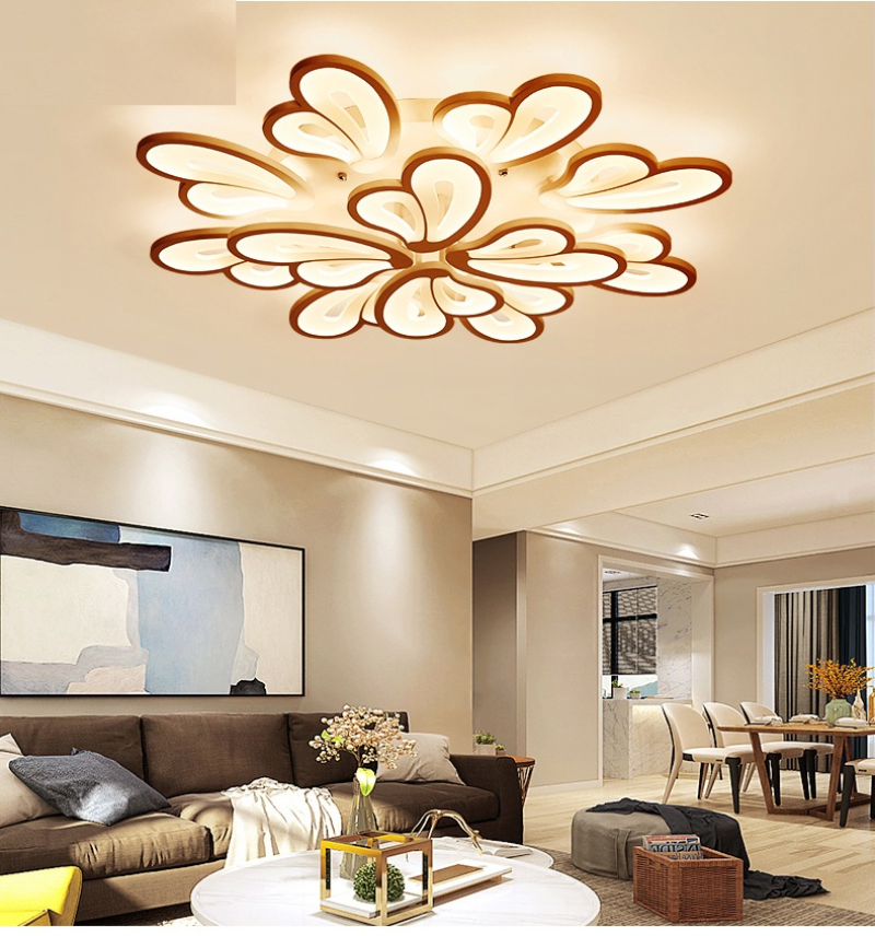 đèn led ốp trần phòng khách với thiết kế cánh bướm cách điệu làm nổi bật không gian phòng